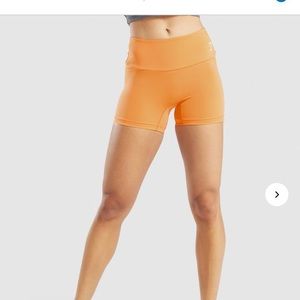 Gymshark orange spandex shorts